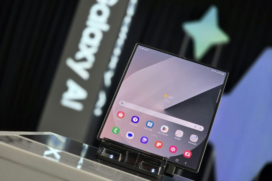 A person standing at a podium with a laptop on it