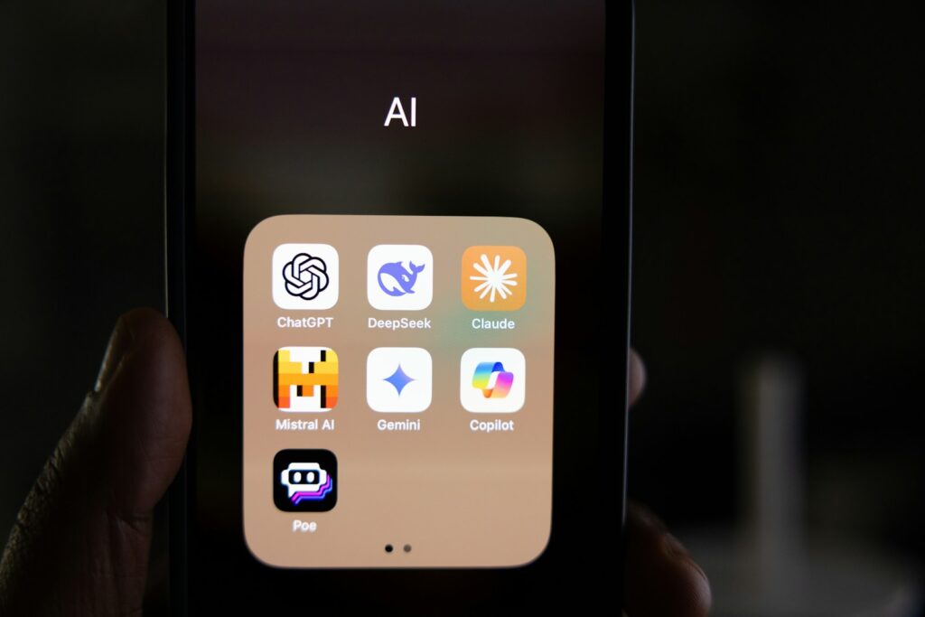 A person holding a smart phone in their hand